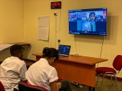 Year 8 students engaging in a video conference with students from India.