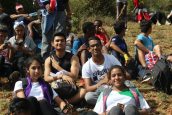 Students rest at the peak after their tough climb 