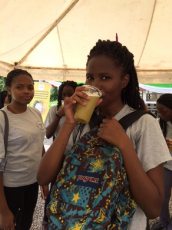 Enjoying a glass of sugarcane juice