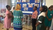 The "Educating Girls in Science" project leaders and beneficiaries talk to the High Commissioner about the project