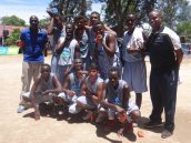 The Boys and their Coaches Eugene Auka (Left) and Jimnah Kimani (right) smile for the camera at the 2016 Kenya High School National Games held at Friends school, Bungoma County