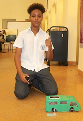 Mahamed Abdi (Year 10) presenting a hybrid model of electric and solar powered Matatu 