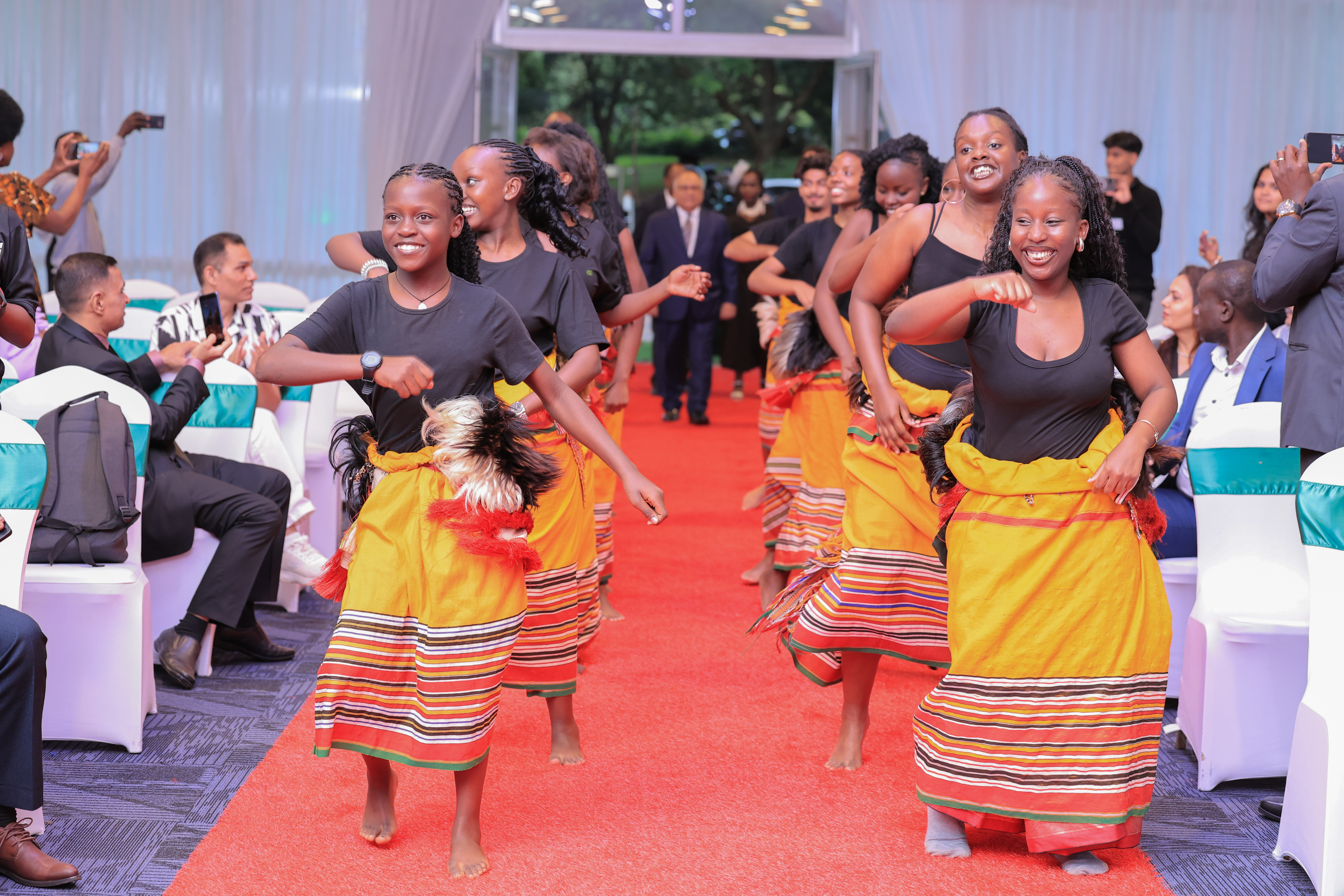 Students at the Aga Khan High School, Kampala performing a dance ahead of the graduation ceremony