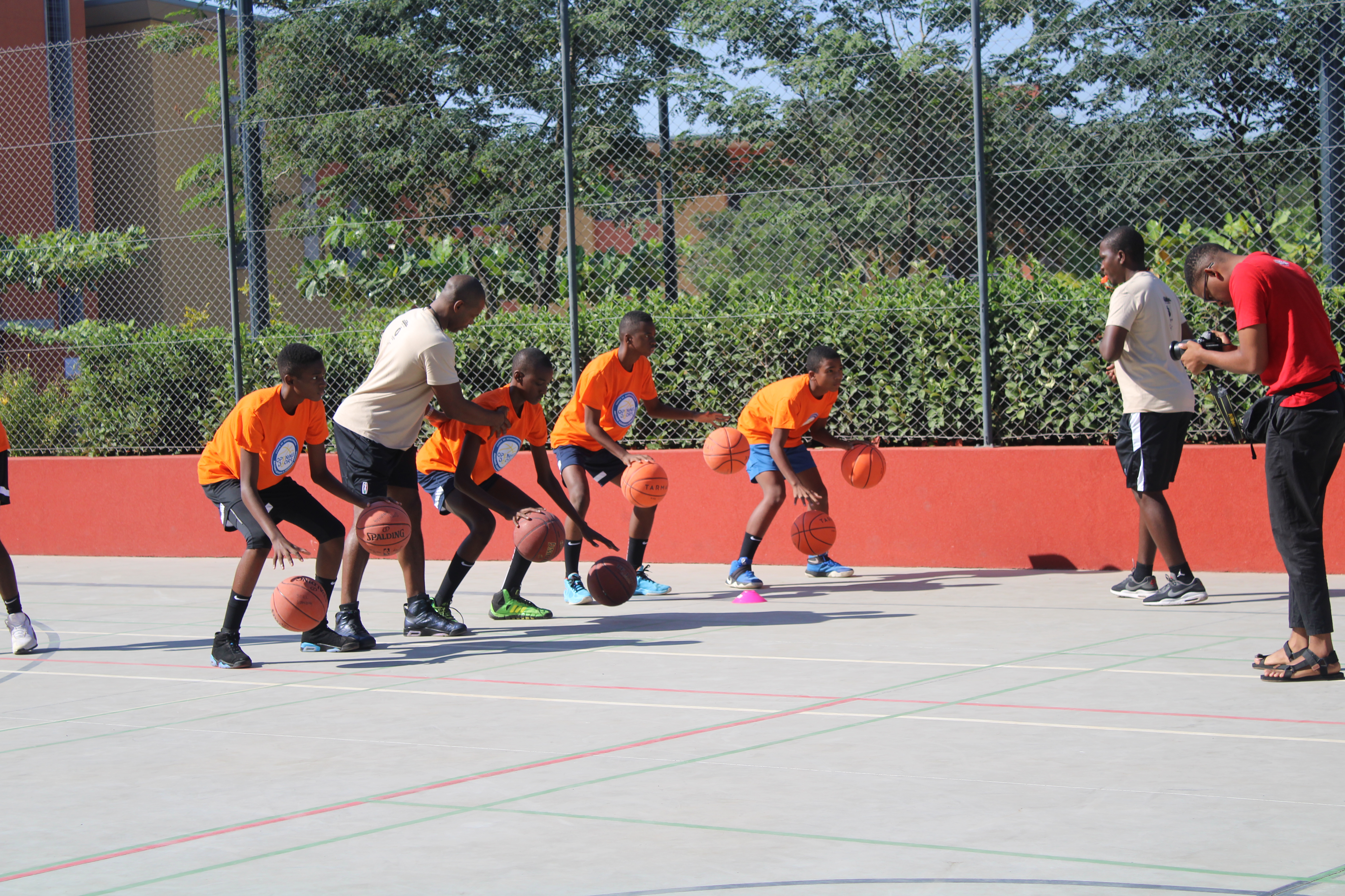Students training in the court at the Academy