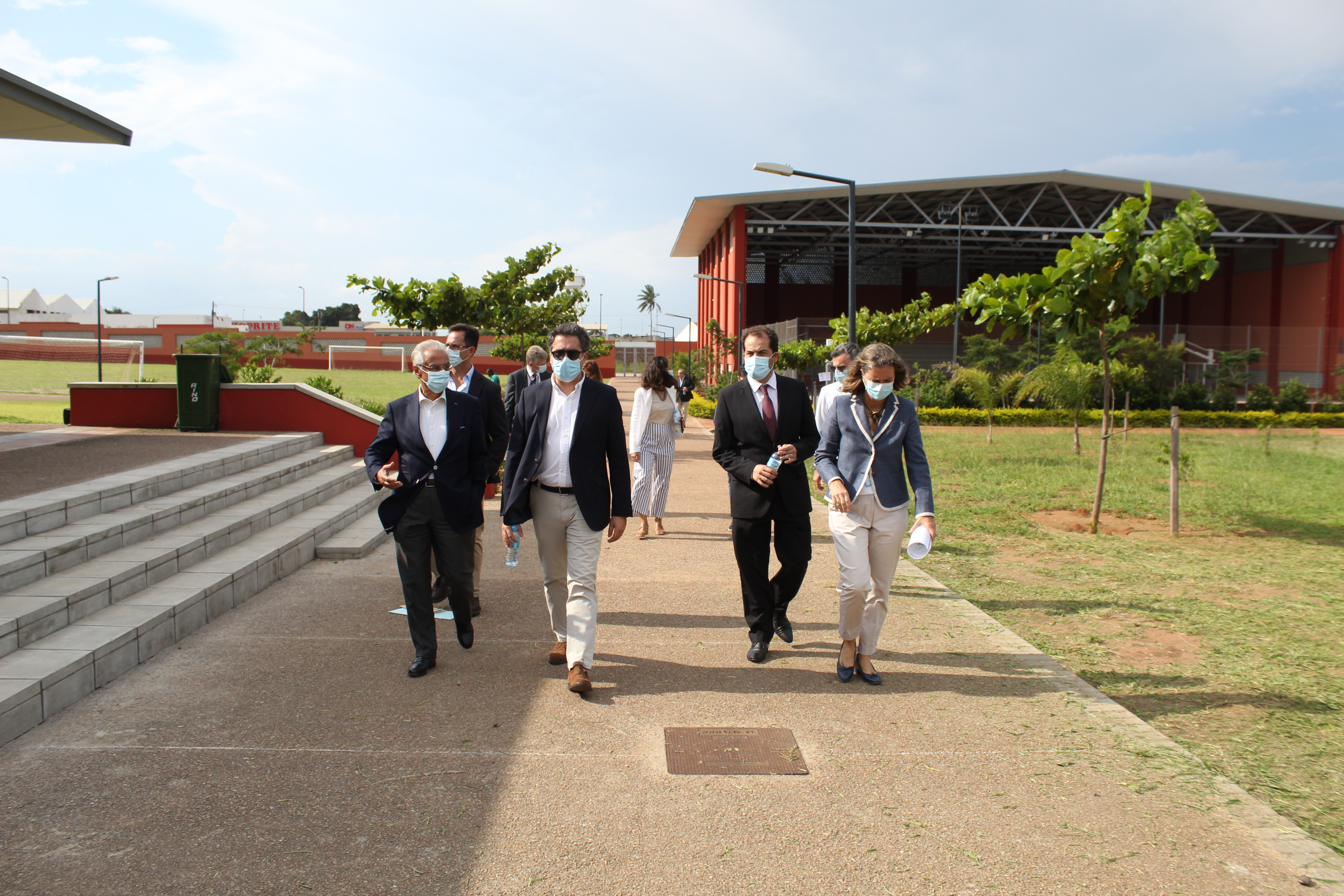 The delegation tours the campus, including the sports facilities shown here.