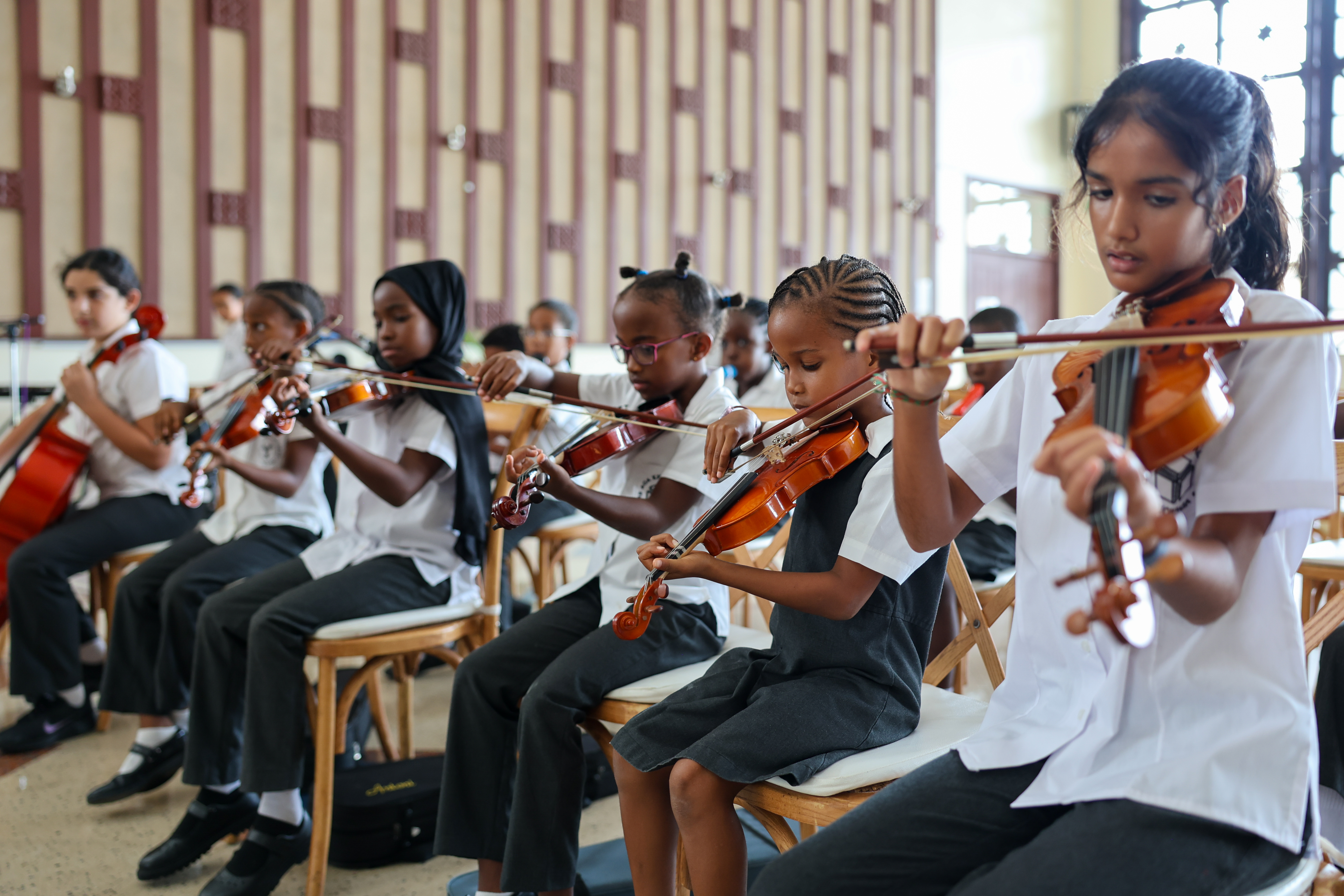 Students performing during the anniversary celebration.