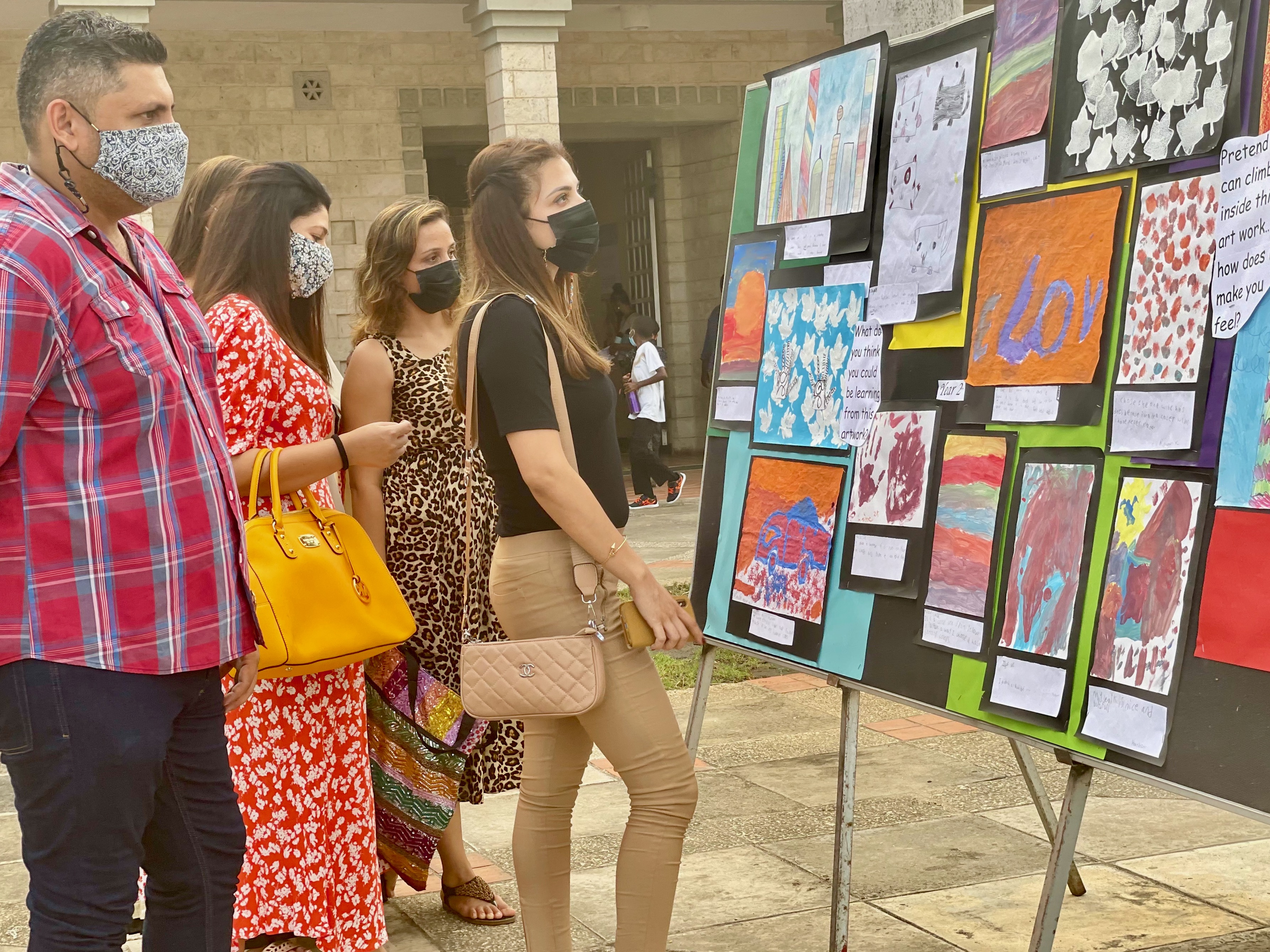 Parents viewing students' art