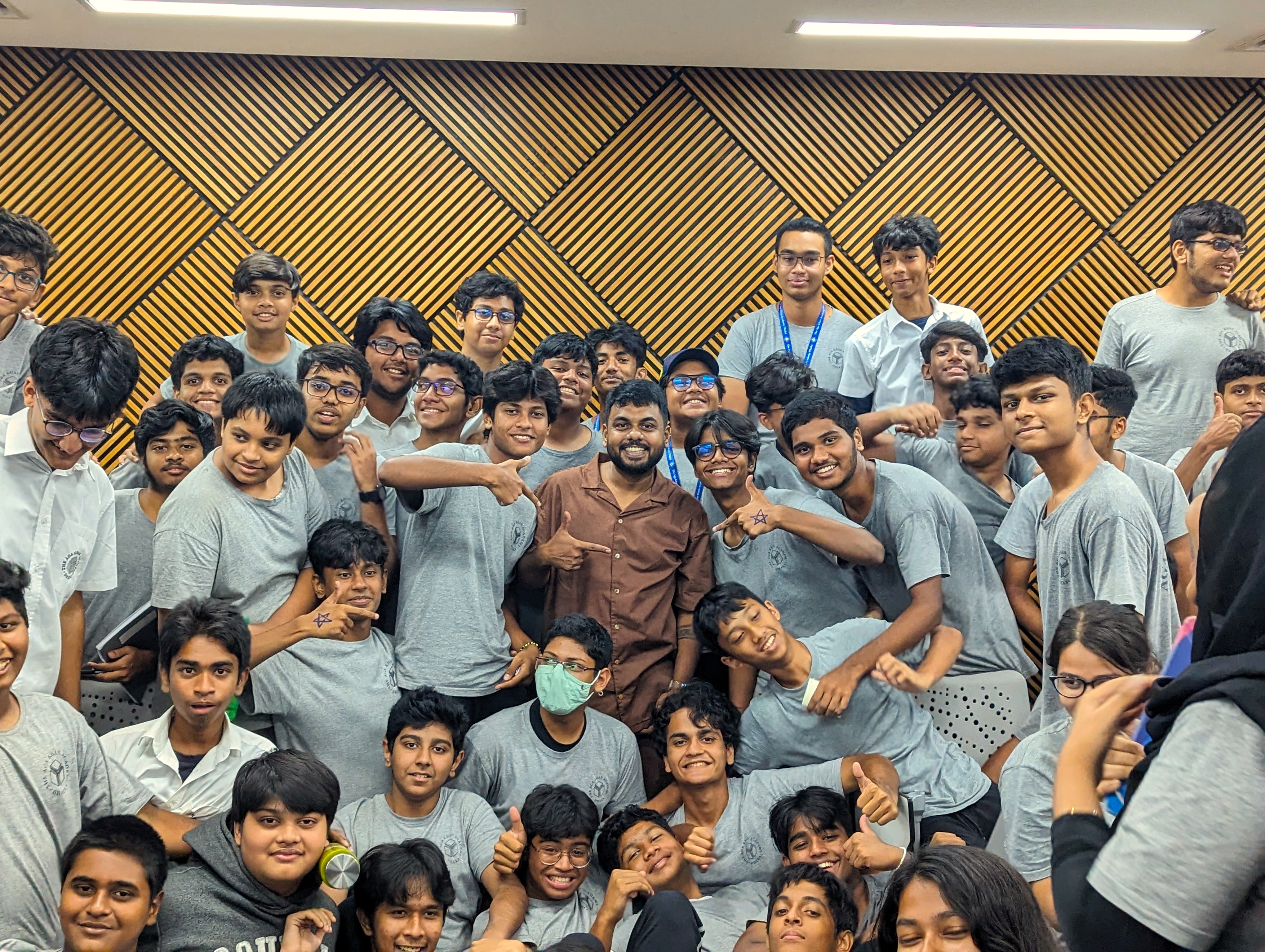 Group photo of Grade 9 students with the guest speaker