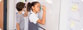 IB learner profile Girl writing on white board