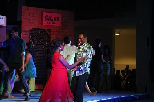 Young lovers Usnavi and Vanessa dance in a scene set at the club