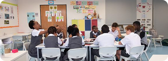 students sitting at table