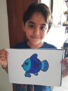 Mikhail Samnani with his drawing
