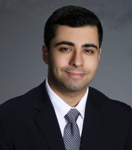 Alqaim Lalani's headshot