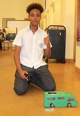 Mahamed Abdi (Year 10) presenting a hybrid model of electric and solar powered Matatu